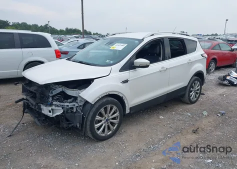 2017 Ford Escape Titanium z USA, uszkodzony, nr VIN 1FMCU9J96HUF09433